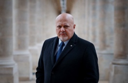 (FILES) International Criminal Court Prosecutor Karim Khan poses during an interview with AFP at the Cour d'Honneur of the Palais Royal in Paris on February 7, 2024. The International Criminal Court's prosecutor Karim Khan said May 20, 2024, that he had applied for arrest warrants for alleged war crimes of top Israeli and Hamas leaders Ismail Haniyeh, Mohammed Deif, Yahya Sinwar, over their conflict, on May 21, 2024. -- Photo: Dimitar Dilkoff / AFP