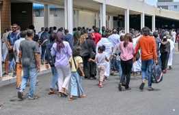 Some pilgrims of the first Maldivian Hajj group heading to the Velana International Airport (VIA) terminal after Dhuhr (midday) prayers on Friday for their departure to Saudi Arabia. -- Photo: Nishan Ali / Mihaaru News