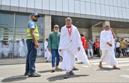 Pilgrims of the first Hajj group departing from Maldives at the Velana International Airport (VIA) on Friday before their departure to Saudi Arabia. -- Photo: Nishan Ali / Mihaaru News