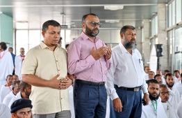 Minister of Islamic Affairs, Mohamed Shaheem Ali Saeed joining the pilgrims of the first Maldivian Hajj group in performing the Friday prayer at the Velana International Airport (VIA) on Friday before the pilgrims' departure to Saudi Arabia for Hajj. -- Photo: Nishan Ali / Mihaaru News