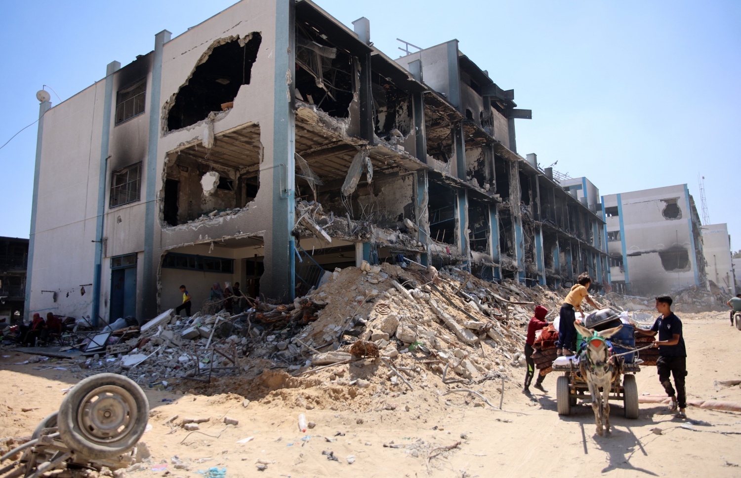 ފަލަސްތީނުގެ ޣައްޒާގައި ސުންނާފަތިވެފައިވާ އިމާރާތެއް: އެމެރިކާ މެދުވެރިވެގެން އިޒްރޭލުން ހުށަހަޅާފައިވާ ސުލްހައިގެ އާ ޕްލޭނުގައި ޣައްޒާ އަލުން ބިނާކުރަން ވަނީ ހިމަނާފައި. --ފޮޓޯ: އޭއެފްޕީ