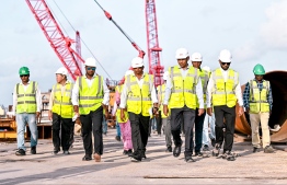 Minister of Construction and Infrastructure, Dr Abdulla Muththalib and Indian High Commissioner to the Maldives Munu Mahawar reviewing progress of the ThilaMale' bridge construction. -- Photo: Fayaz Moosa / Mihaaru News