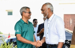 President Dr Mohamed Muizzu, shaking hands with the Minister of Climate Change, Environment and Energy, Thoriq Ibrahim during the ceremony held on Wednesday to launch the 5 Million Trees Plantation Program announced earlier by the President. -- Photo: President's Office