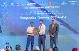 Vice President Hussain Mohamed Latheef and Marriott International President, APEC Rajeev Menon with an apprentice of the Second Cohort of MIMAP.-- Photo: Marriott International