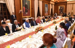 President Dr Mohamed Muizzu attending the banquet hosted by the President of India in honor of country leaders that participated in Prime Minister Modi's oath-taking ceremony together with the Prime Minister. President Muizzu was seated directly beside Modi during this banquet with Sri Lankan President Ranil Wickremesinghe seated on the right. -- Photo: President's Office