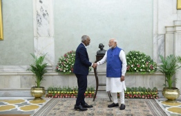 President Dr Mohamed Muizzu and Prime Minister Narendra Modi shaking hands after the swearing-in ceremony of Modi for his third consecutive term. -- Photo: President's Office