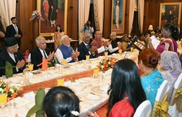 President Dr Mohamed Muizzu attending the banquet hosted by the President of India in honor of country leaders that participated in Prime Minister Modi's oath-taking ceremony together with the Prime Minister. President Muizzu was seated directly beside Prime Minister Modi during this banquet with Sri Lankan President Ranil Wickremesinghe seated on the right. -- Photo: President's Office