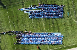 The large Eid-al-Adha prayer congregation in B. Kendhoo football stadium today. -- Photo: Fayaz Moosa / Mihaaru News