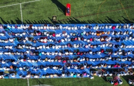 The large Eid-al-Adha prayer congregation in B. Kendhoo football stadium today. -- Photo: Fayaz Moosa / Mihaaru News