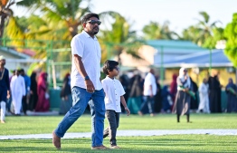 Parliamentarian of the Kendhoo constituency, Mauroof Zakir heading to the B. Kendhoo football stadium to join the Eid-al-Adha prayer congregation today. -- Photo: Fayaz Moosa / Mihaaru News