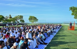 People who joined the large Eid-al-Adha prayers congregation listening to the sermon delivered in B. Kendhoo football stadium today. -- Photo: Fayaz Moosa / Mihaaru News