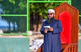 The Imam delivering the sermon at the Eid-al-Adha prayer congregation in B. Kendhoo football stadium today. -- Photo: Fayaz Moosa / Mihaaru News