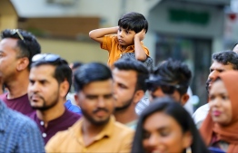 A child watching a special activity performed for Eid-al-Adha yesterday. -- Photo: Mihaaru News