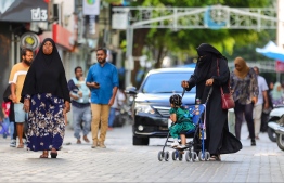 Residents on the streets of Male' City yesterday during the vehicle ban issued from 16:00 hrs to 18:00 hrs on occasion of Eid-al-Adha. -- Photo: Mihaaru News