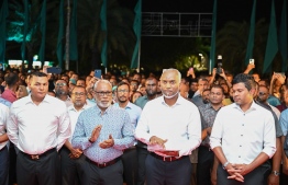 Speaker of Parliament and People's National Congress (PNC) Chairperson, Abdul Raheem Abdulla, Vice President Hussain Mohamed Latheef and Parliamentarian of the Meedhoo Constituency, Ahmed Siyam Mohamed standing next to President Dr Mohamed Muizzu during the ceremony held last night to open the new PNC hub, 'PNC House'. -- Photo: PNC