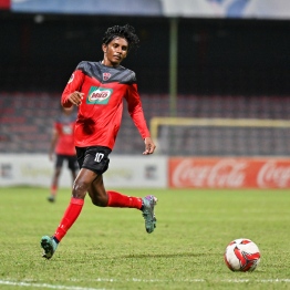 A TC Sports Club player moving the ball forward during the U19 Youth Championships finals where TC competed against Super United Sports. -- Photo: Fayaz Moosa / Mihaaru News