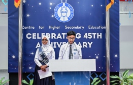 Two students of Centre for Higher Secondary Education (CHSE) announcing the agenda of the special assembly held at the school to commemorate their 45th anniversary. -- Photo: President's Office