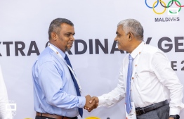 Secretary General of Athletics Association of Maldives, Ahmed Munthaqim (L) with the President of the Maldives Olympic Committee, Mohamed Abdul Sattar.