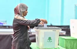 Fathimath Waheeda, mother of Table Tennis star, Dheema Ali casting her vote at yesterday's election. -- Photo: Fayaz Moosa / Mihaaru News