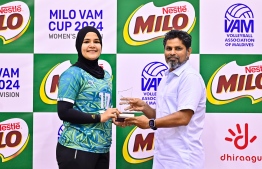 The best player of VAM Cup's final match, WAMCO's Aishath Majidha accepting her plague. -- Photo: Fayaz Moosa / Mihaaru News