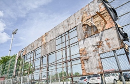 Billboards affixed on the outer fence of the FAM Turf Ground now devoid of a canvas with the wooden panels also worn and damaged. The advertisements that previously frequented these billboards were a source of income for FAM. -- Photo: Nishan Ali / Mihaaru News.