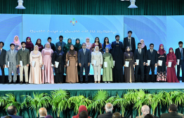 Minister of Health Dr Abdulla Khaleel with the Scholarship awardees.-- Photo: Nishan Ali / Mihaaru