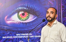 Minister of Youth Empowerment, Information and Art, Ibrahim Waheed speaking at the art exhibition 'Unveiling Visions 2024' which featured talented artworks of local artists. -- Photo: Fayaz Moosa / Mihaaru News