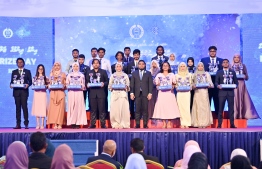 Students who achieved top ranks in their academics at the Centre for Higher Secondary Education's (CHSE) posing for a group photo at the school's annual Prize Day ceremony held on Monday night. -- Photo: President's Office