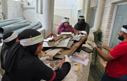 Employees cleaning the IGMH Hospital.