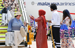 Passengers of flight MH485 welcome with traditional dances at VIA -- Photo: Nishan Ali