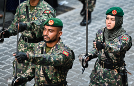 MNDF troops marching in the parade held yesterday to commemorate Maldives' Independence Day. -- Photo: Fayaz Moosa / Mihaaru News