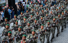 MNDF troops marching in the parade held yesterday to commemorate Maldives' Independence Day. -- Photo: Fayaz Moosa / Mihaaru News