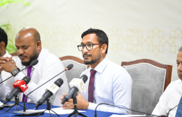 MP Falah (R) and MP Shujau (L) speaking with local media after the Parliamentary session today -- Photo: Parliament