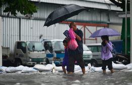 A street in Male' City flooded due to heavy rain. -- Photo: Fayaz Moosa / Mihaaru News