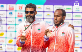 [File] Abdul Razzaq and his guide runner, Athif Ibrahim posing for a photo with their medal during the Indian Ocean Island Games 2023. -- Photo: Ismail Thoriq / MOC