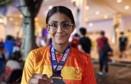 Meral Ain Athif who clinched silver and bronze medals at the Asian Open Schools Invitational (AOSI) Short Course (25m) Age Group Swimming Championships held in Thailand.