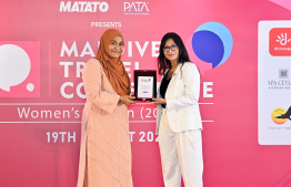 At the opening ceremony of the 'Maldives Travel Conference - Women's Edition' held at Hotel Jen, MATATO CEO Aishath Suzan presents a commemorative plaque to the First Lady. 
Photo | President's Office