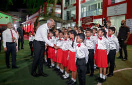 President Dr Mohamed Muizzu shaking hands with students of Majeediyya School during the special ceremony held at the school last night to commemorate their anniversary. -- Photo: President's Office