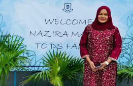 Former principal of Izzudheen School Nazira Hassan receives a warm welcome from the staff and students of  Dharumavantha School,