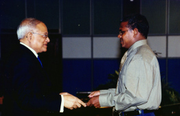 Moosa Latheef conferred the National Award of Recognition in the field on journalism in 2001 by then President, Maumoon Abdul Gayoom. -- Photo: President's Office