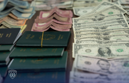 Some of the funds found in possession of the expatriates in today's operation.-- Photo: Immigration