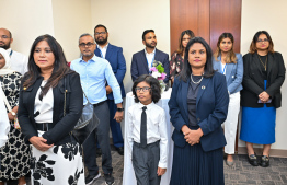 Maldivian families taking part in the ceremony held to arrange the President's meeting with the Maldivian community residing in America. -- Photo: President's Office