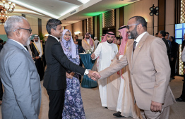 Vice President Hussain Mohamed Latheef and Minister of Islamic Affairs Dr Mohamed Shaheem Ali Saeed shaking hands at the ceremony held at Villa Nautica Maldives Resort to celebrate the 94th National Day of Saudi Arabia. -- Photo: President's Office