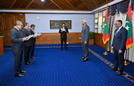 Newly appointed cabinet ministers taking their oath of office -- Photo: President's Office