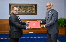 President Dr Mohamed Muizzu has presented the letter of appointment to Moosa Zameer, appointing him as the Minister of Finance -- Photo: President's Office