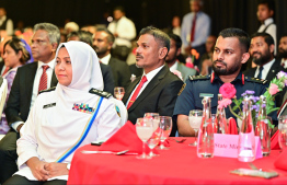 Immigration Controller Mohamed Shamaan Waheed and Commissioner General of Customs Fathimath Dhiyana attending the 75th National day ceremony of China -- Photo: Fayaz Moosa