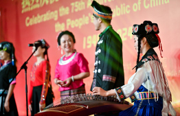 A demonstration of cultural dances and songs during the reception held to mark the 75th National Day of China -- Photo: Fayaz Moosa