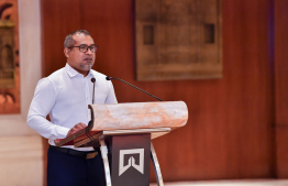 Minister of Foreign Affairs Dr Abdulla Khaleel speaking at yesterday's meeting with Maldivians residing in New Delhi.-- Photo: President's Office