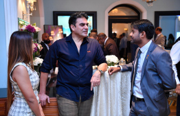 MMPRC MD Ibrahim Shiury converses with Bollywood actor Arbaaz Khan at the ceremony held in Mumbai to promote Maldives tourism and business --- Photo/President's Office