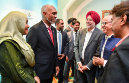 The President converses with some attendees at the event in Mumbai to promote Maldives tourism and business --- Photo/President's Office